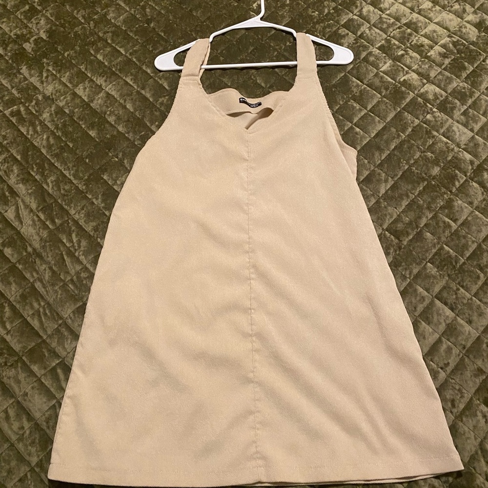 Cute overall dress! Layer over a blouse & you’ve got a cute outfit!